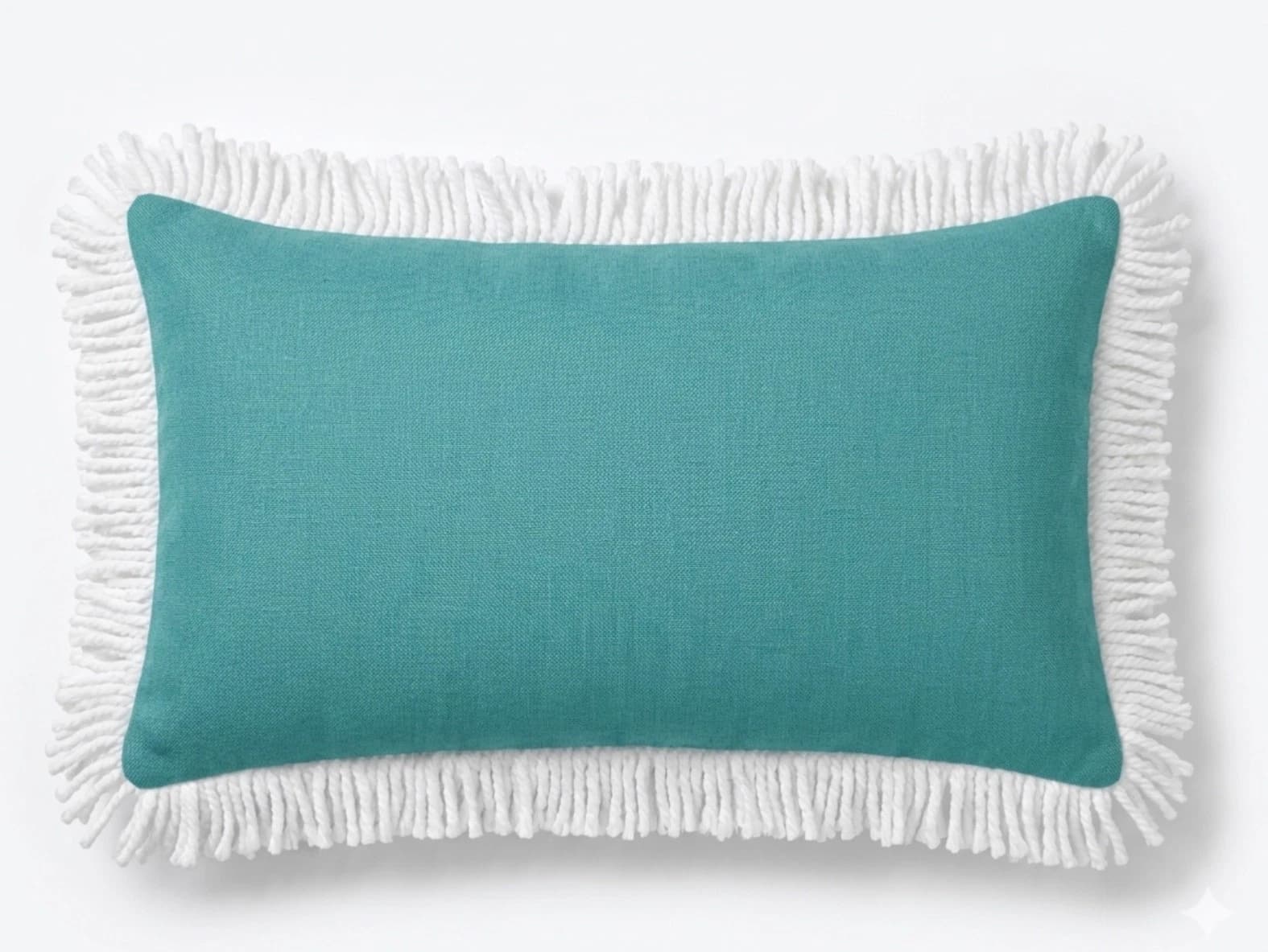 Teal fabric lumbar throw pillow with white fringe trim and braided white stitching, displayed against a plain light background.