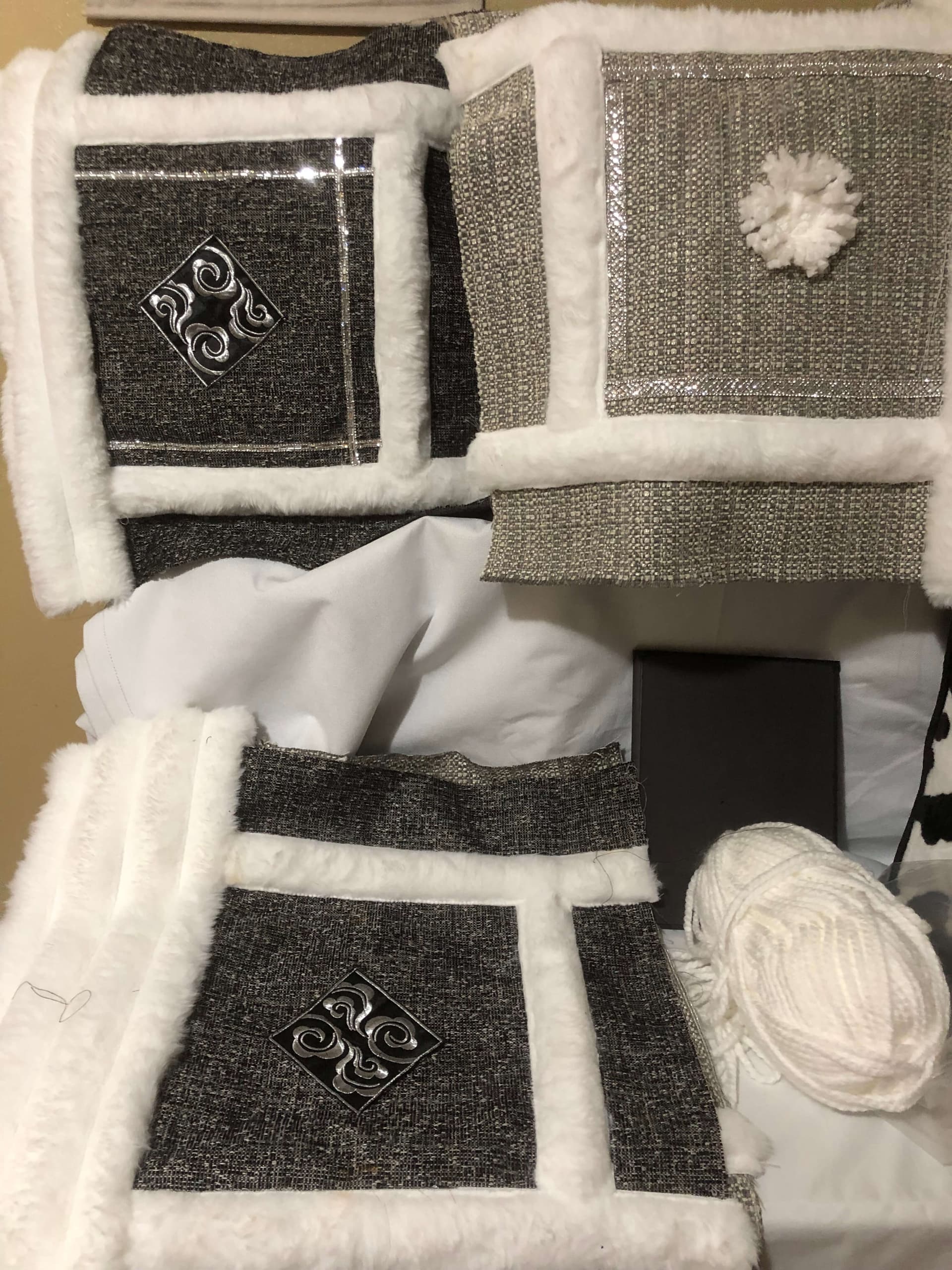 Silver and charcoal handmade pillow cover designs with faux-fur trim and textured fabric